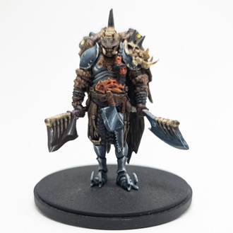 Painted miniature of the Butcher from Kingdom Death: Monster